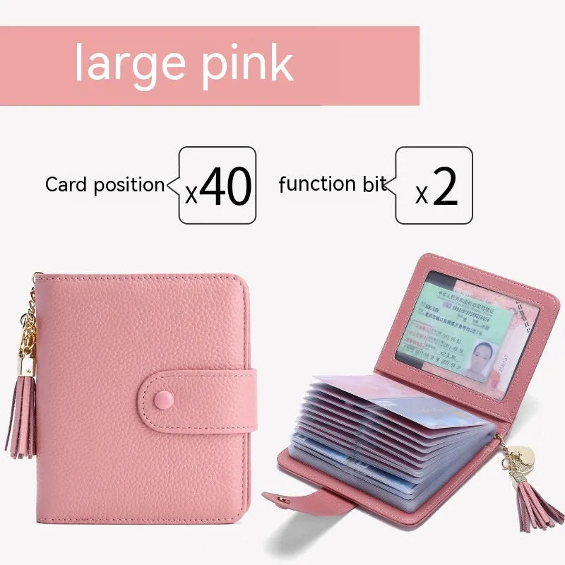 Large capacity genuine cowhide leather card holder wallet with tassel, snap closure, 40 card slots, and ID holder