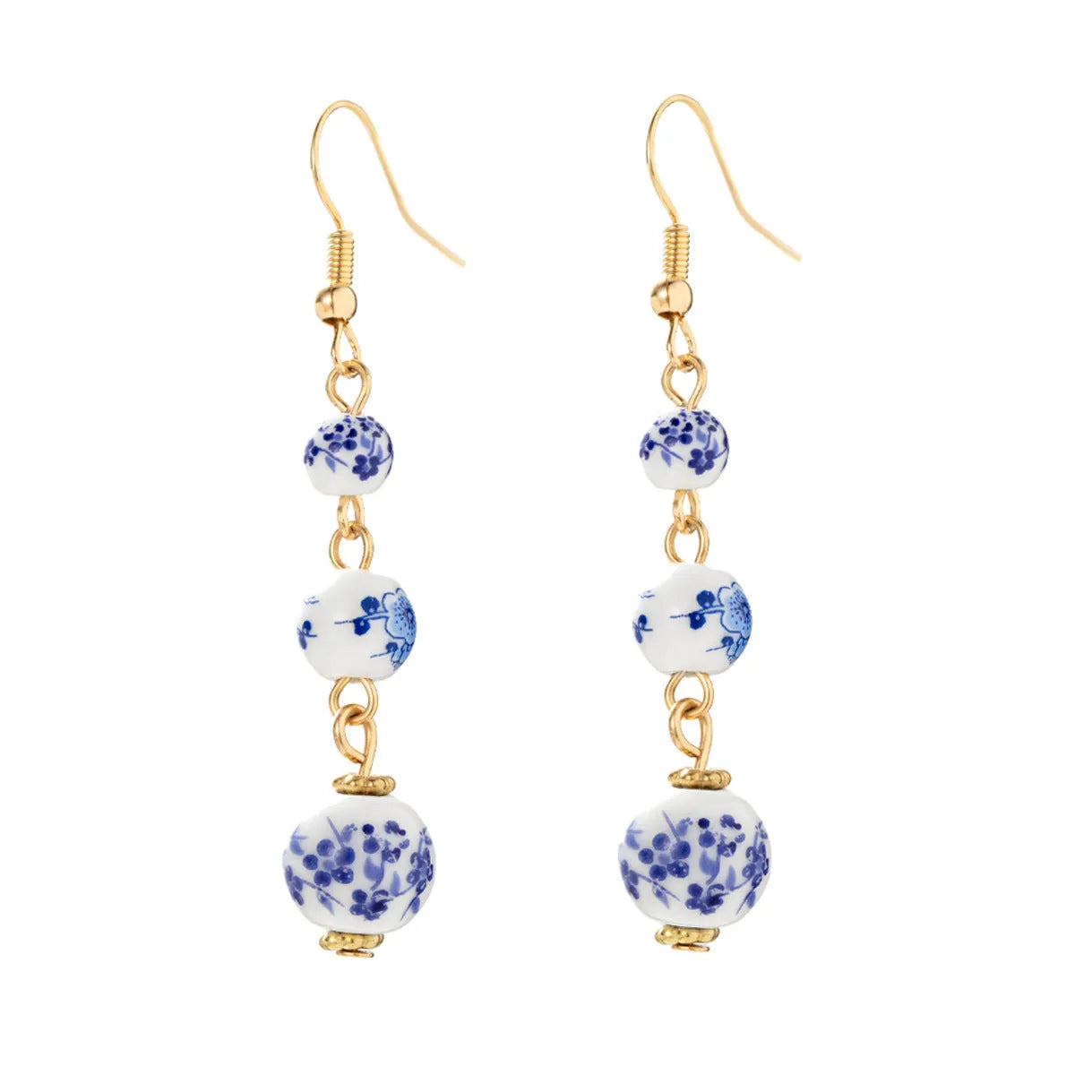 Long blue and white porcelain ceramic bead retro geometric earrings with alloy electroplated frame.