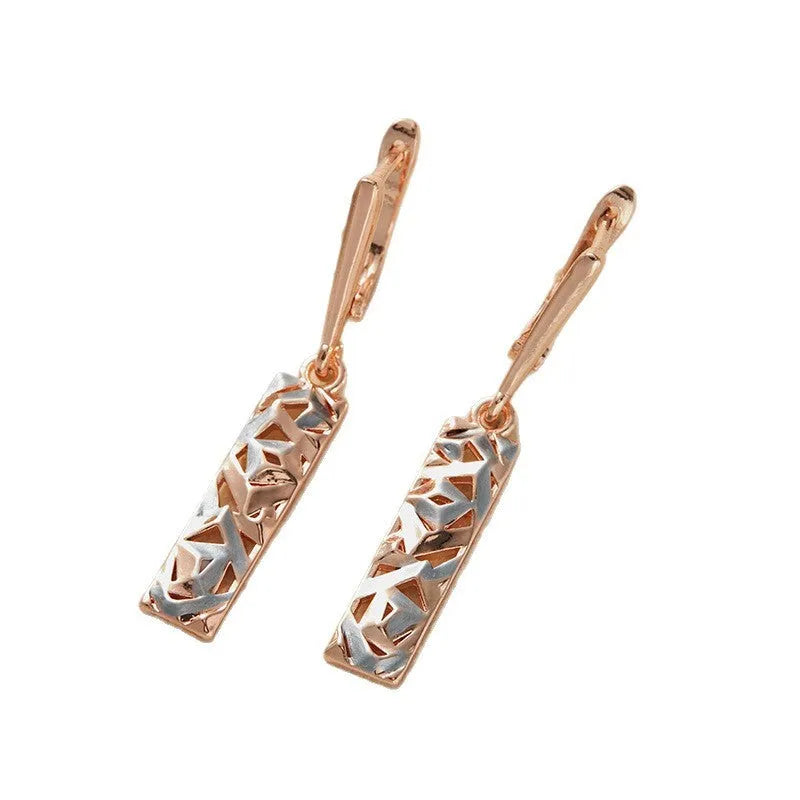 Rectangular two-tone hollow stud earrings for women with a geometric electroplated alloy design.