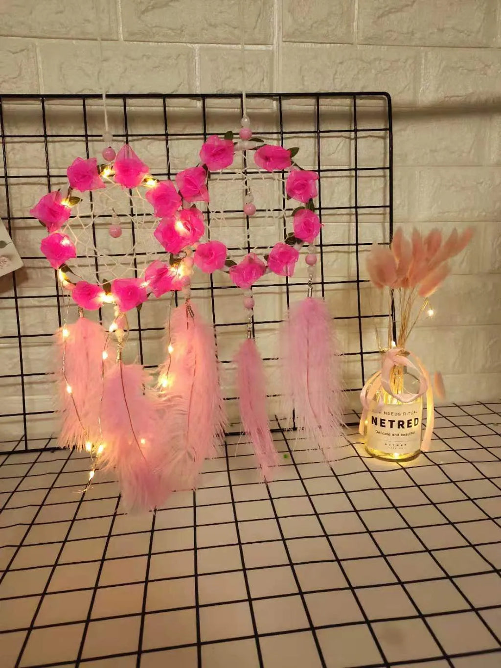 Pink ostrich feather dreamcatcher wind chimes wall decoration measuring 10cm