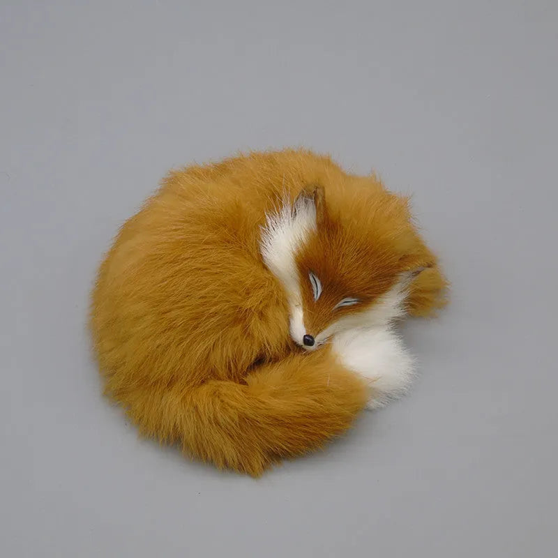 Small white artificial fox fur ornament for car or home decoration.