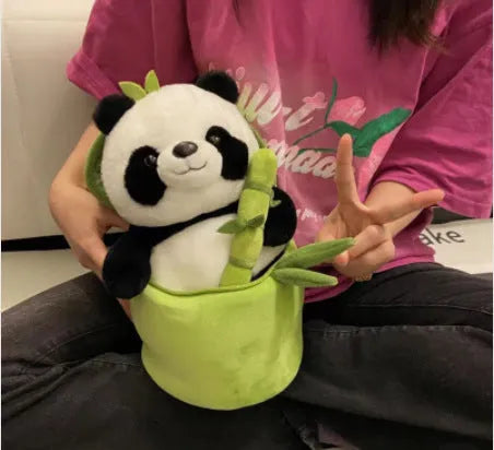 Panda plush doll pillow holding simulated bamboo tube, black and white soft toy