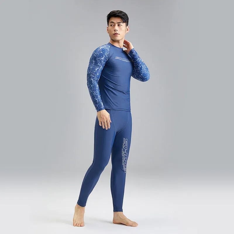 Dark blue men's swimwear set with patterned nylon top and matching swim trunks