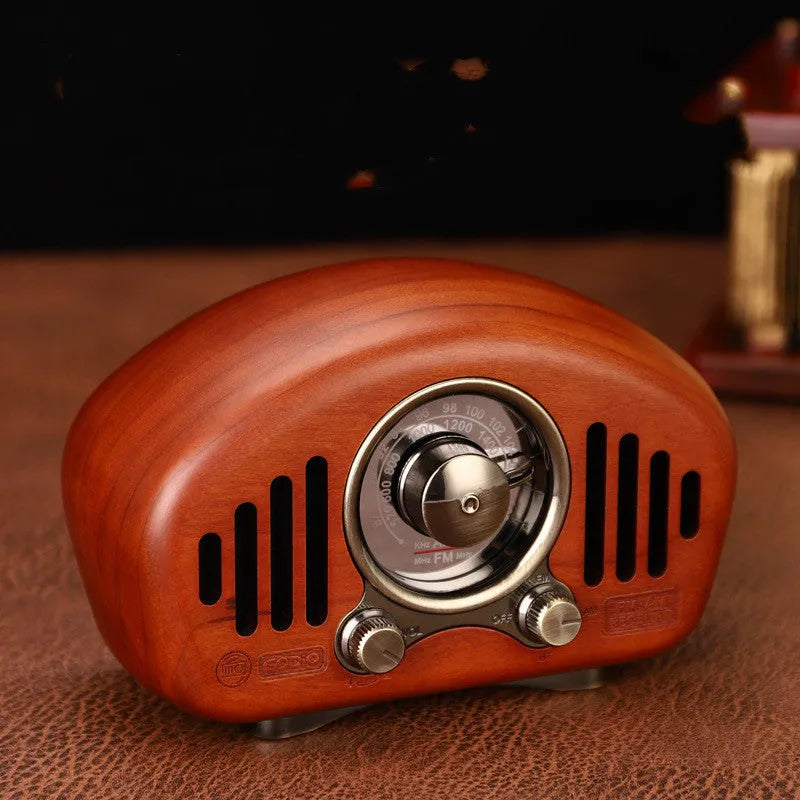 FMAM portable Bluetooth speaker with FM radio in Cherry or Walnut, 3600 mAh battery, USB interface.