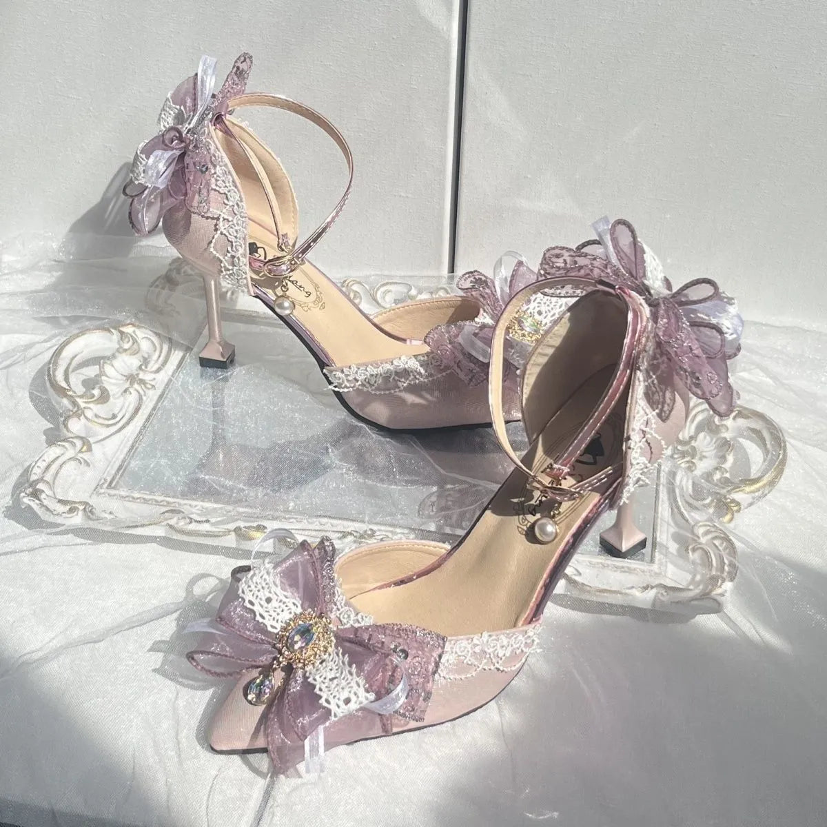 Purple satin women's wedding shoes with square toe and stiletto heel on white background