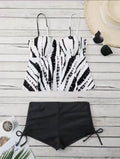 Women's printed bikini swimsuit with hard cups in blue, shown as a top and shorts set.