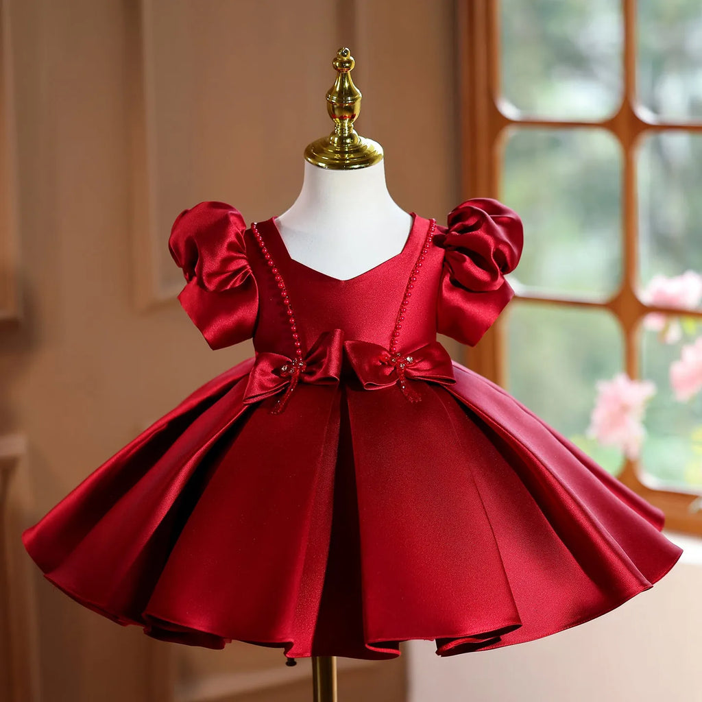 Girls wine red polyester princess party dress for birthdays and evening events, available in 80cm to 150cm height sizes.