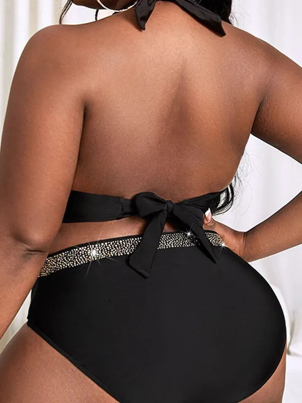 Black plus size women's bikini swimsuit with bra top and shorts, sizes 0XL to 4XL.