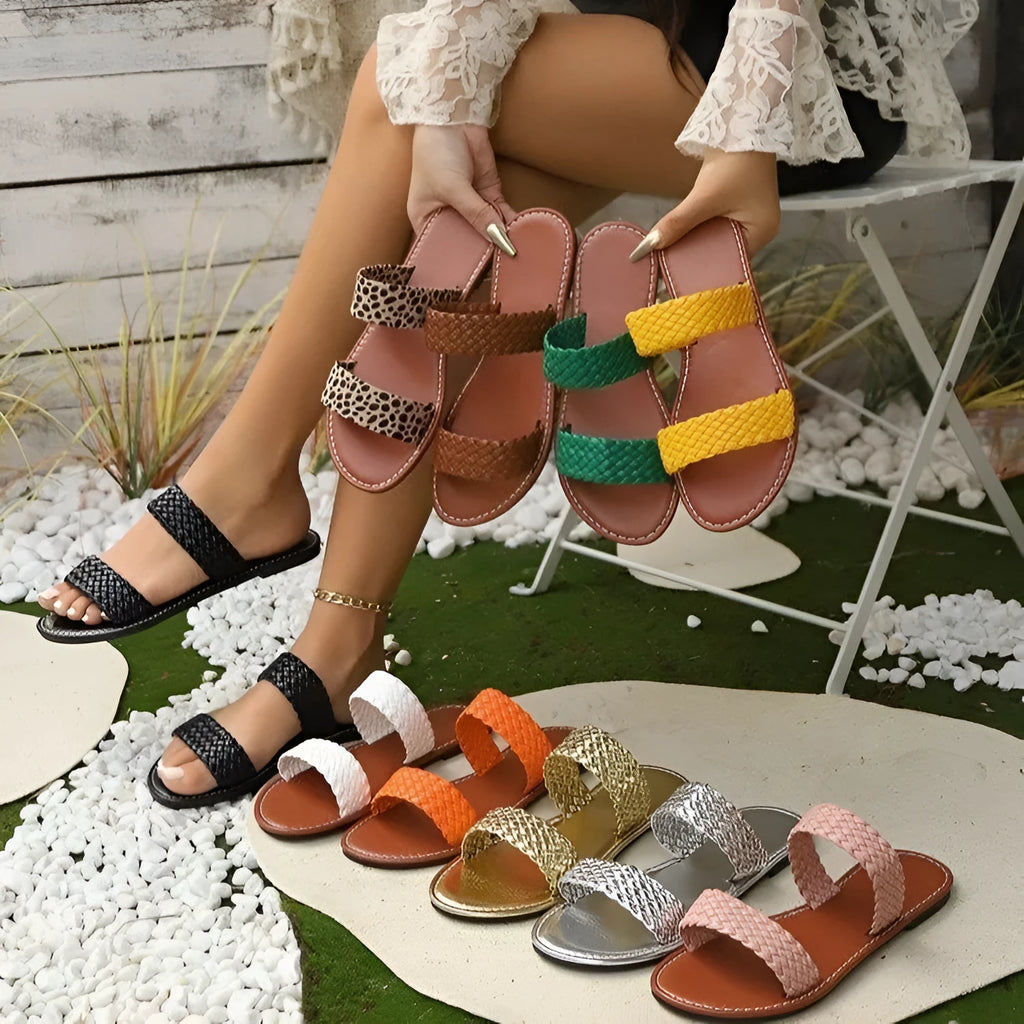 Women's woven beach slipper in gold showing synthetic leather upper and PVC sole, available in UK sizes 36-43.