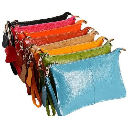 Lady cowhide slant bag showing compact dimensions and multiple compartments for organisation