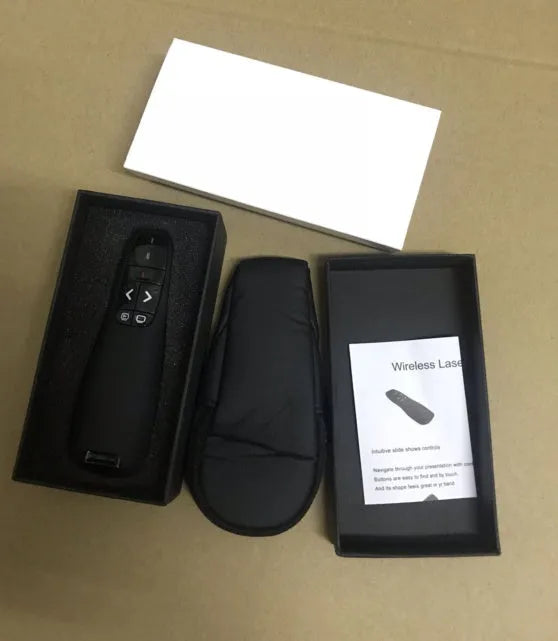 Black wireless laser pointer remote control for presentations with USB receiver stored inside