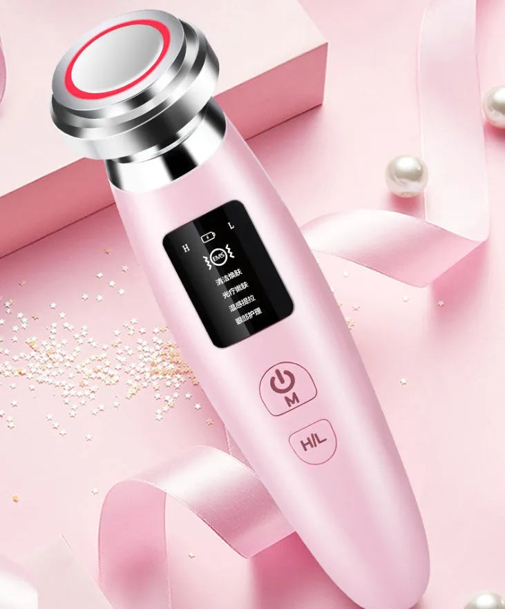 Pink LED cleansing and rejuvenating beauty instrument with facial brush, 185mm length handheld design