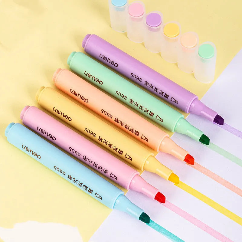 Deli S605 oblique head highlighter pens in Macaron and crystal colours with solid and transparent penholders.