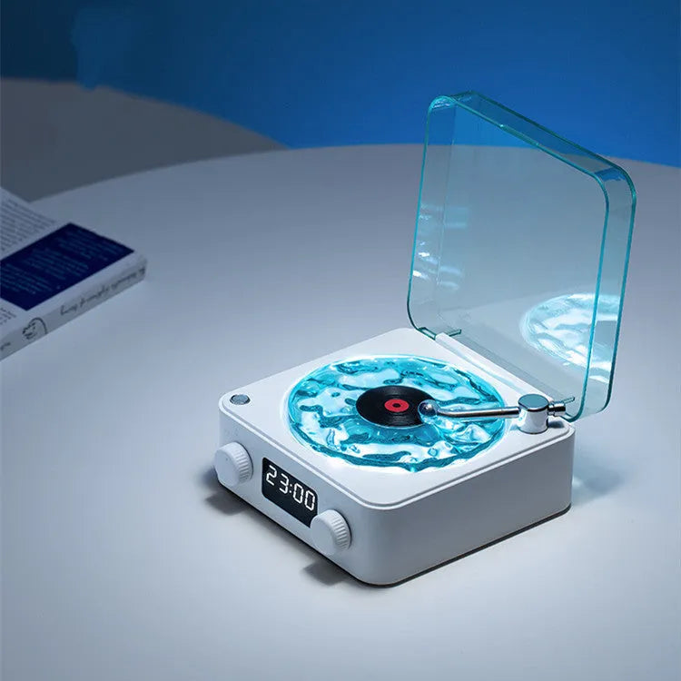 Retro-style Bluetooth speaker with rotating vinyl turntable and RGB coloured lighting effects