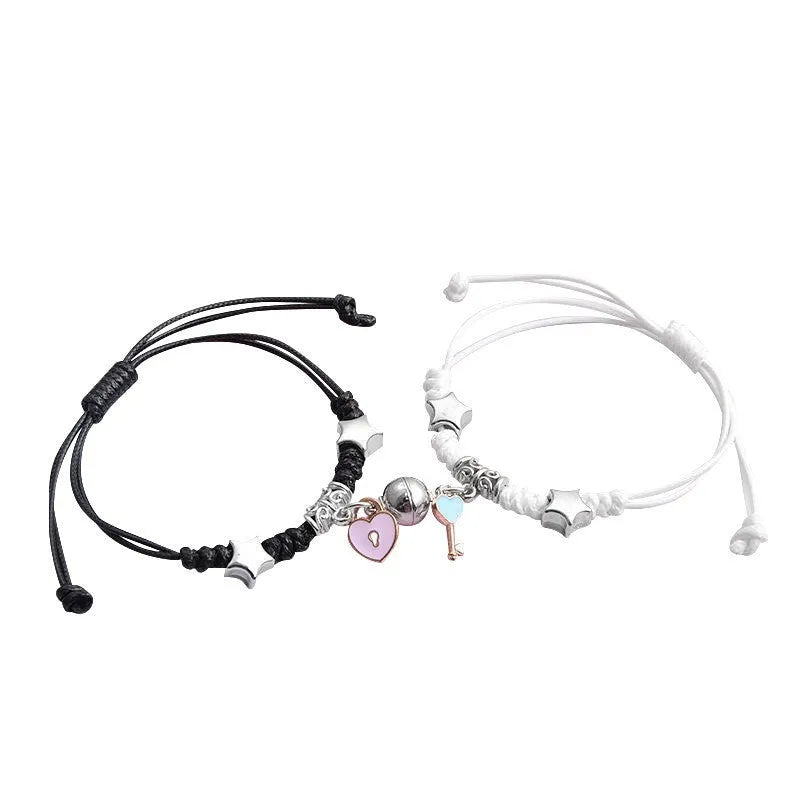 Pair of adjustable alloy bracelets with magnetic clasp showing detailed design of Crown and Clover styles