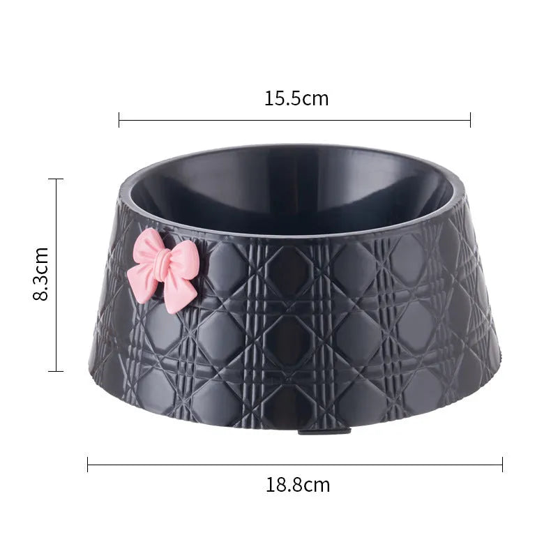 Decorative pet bowl with bowknot and diamond pattern in pink, silver, black, purple, and white colours.