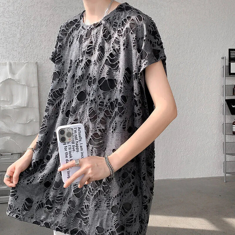Black ripped sleeveless vest with wide shoulders and loose Japanese retro pullover style.