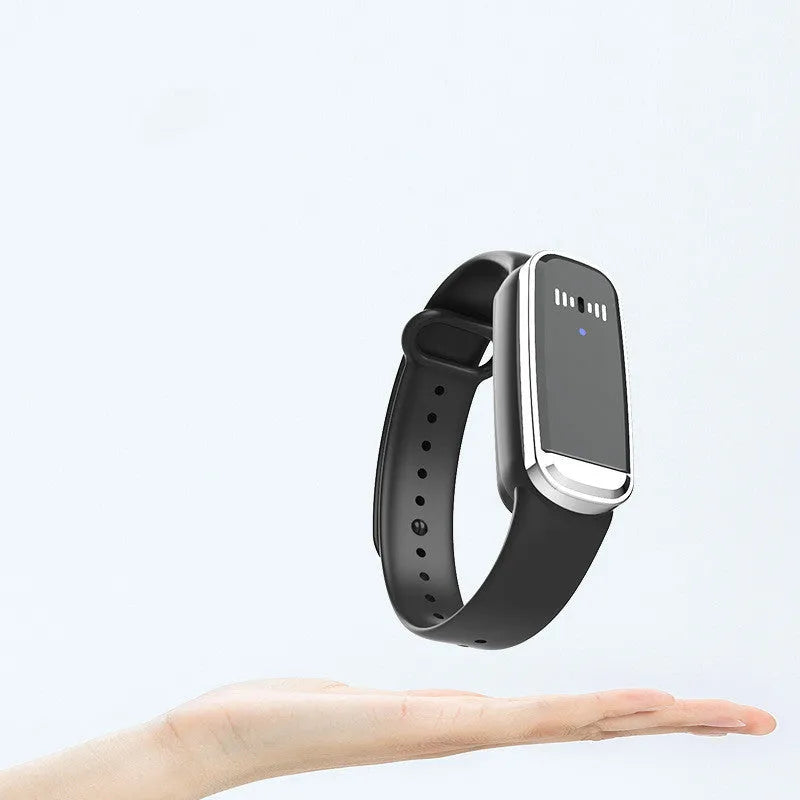Black and white ultrasonic mosquito repellent bracelet for babies and pregnancy, shown with USB charging cable.