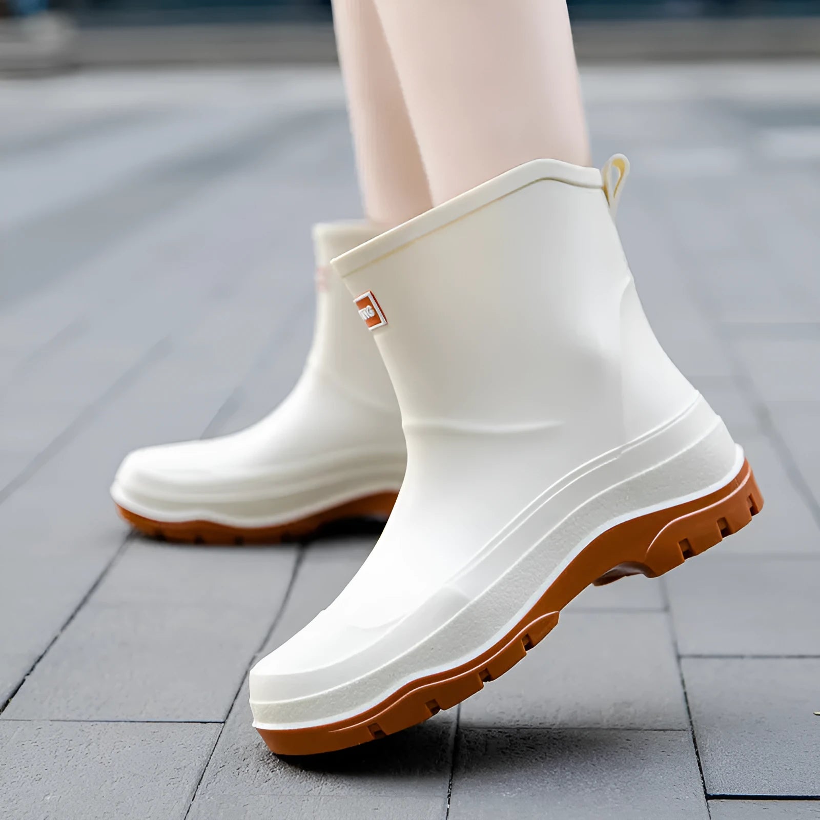 Women's waterproof rubber ankle boots with non-slip soles in multiple colour options