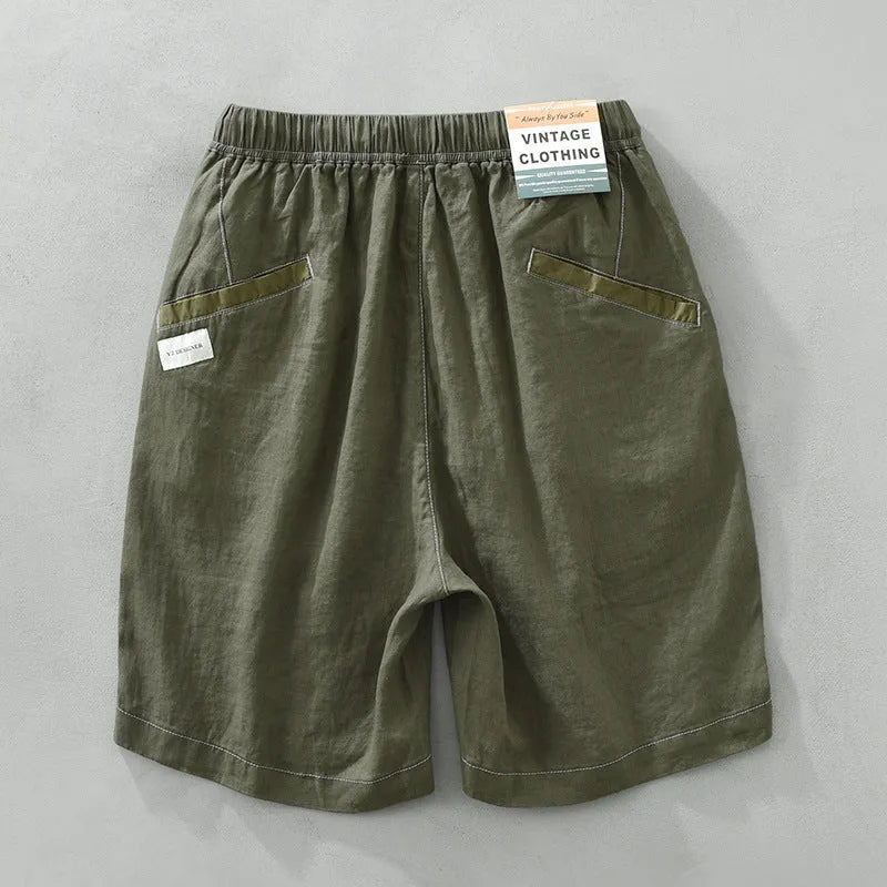 Men's loose straight linen shorts in black or green with drawstring waist
