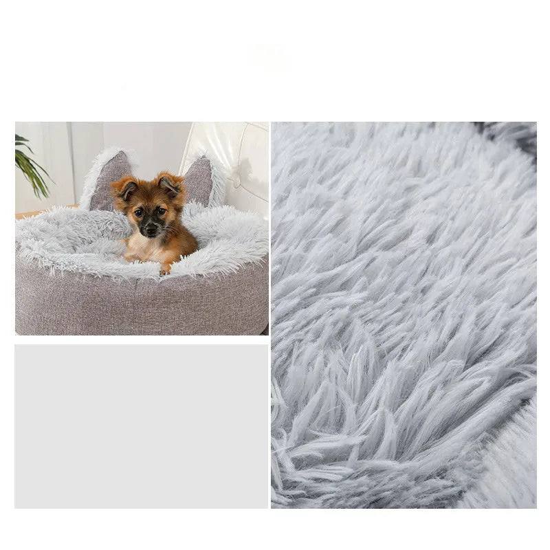 A round soft grey faux fur plush pet bed for cats or small dogs on a wooden floor.