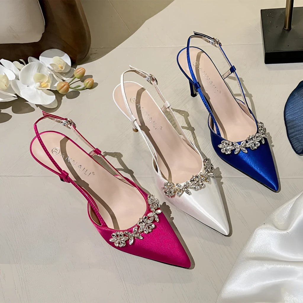 Women's satin stiletto high heels with rhinestone closed toe and buckle fastening in white, rose red, or blue