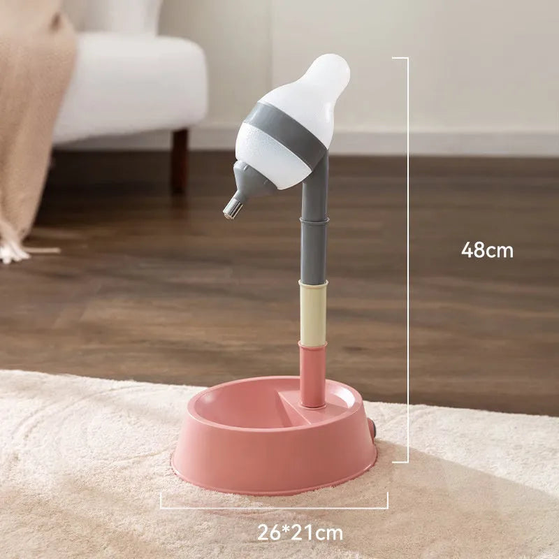 Green adjustable pet water dispenser showing detachable pole, bowl with water-weight holder, and steel ball-tip nozzle