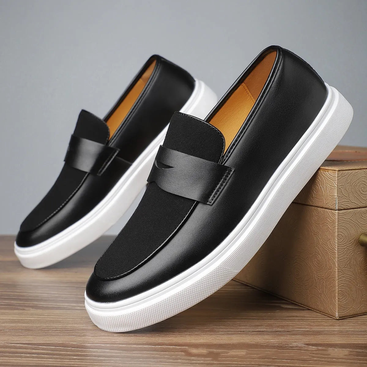 Men's black slip-on casual shoes with tassel decoration and round toe