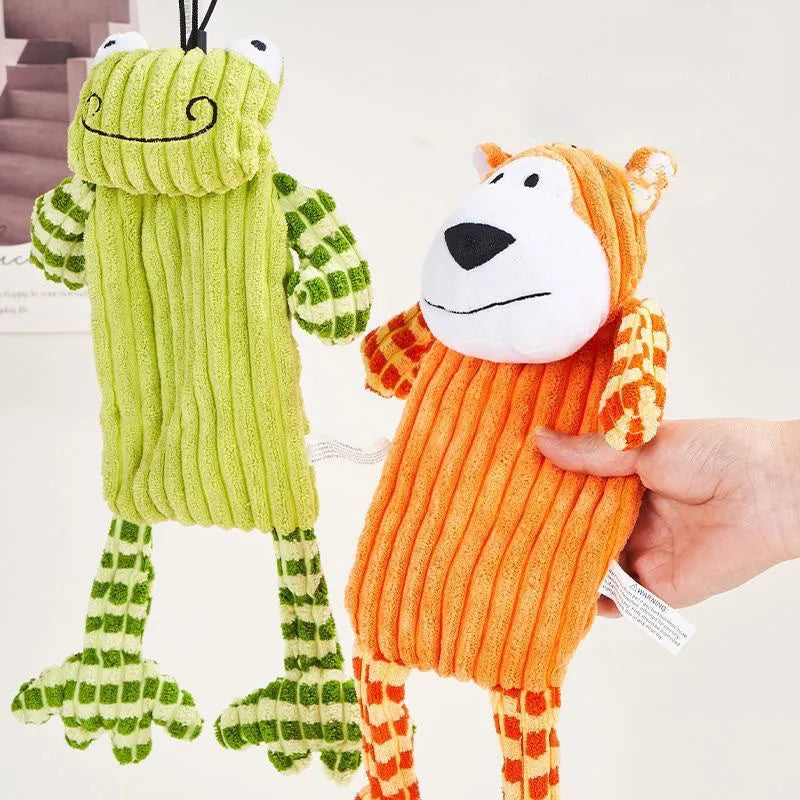 Green or orange plush dog toy with immortal squeaker for aggressive chewers