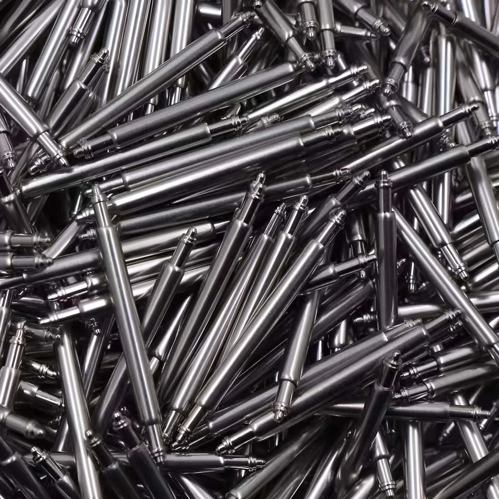Watch spring bars and auricular tool kit for strap replacement in sizes 21mm to 26mm.