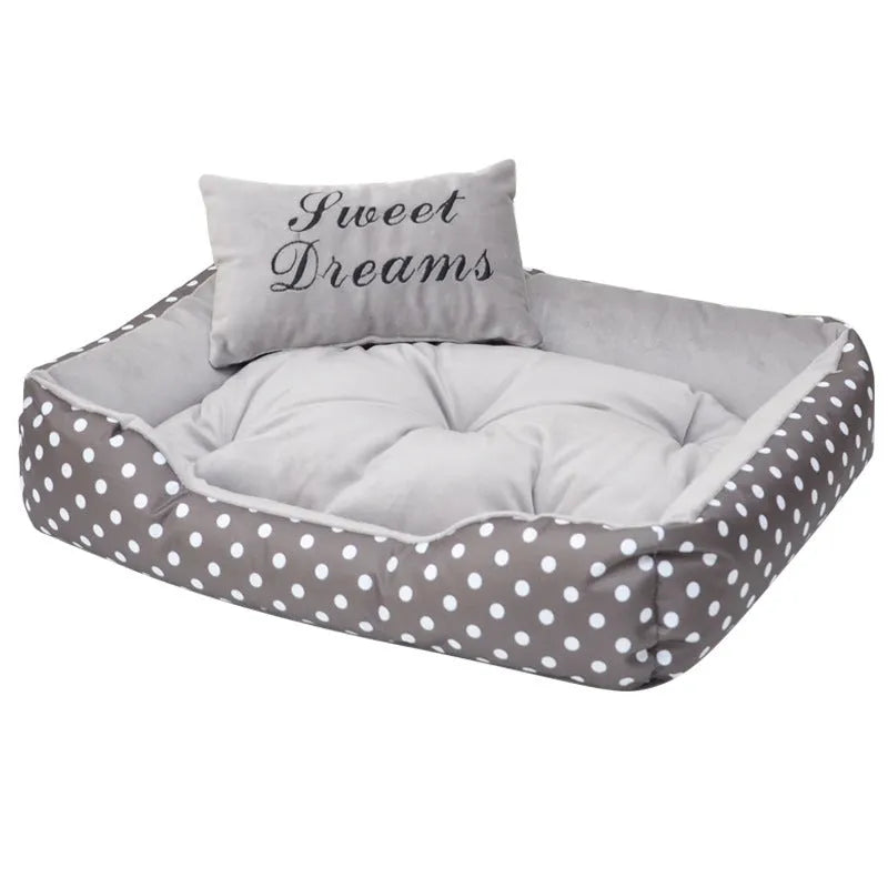 Polka dot print square dog bed with a matching embroidered pillow in grey.