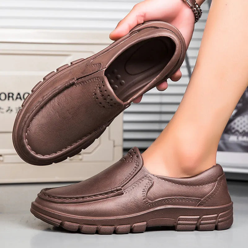 Men's black slip-on work shoes with artificial leather upper and platform mid-heel design