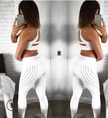 Women's glow-in-the-dark workout leggings in black with printed pattern, slim fit pencil pants length