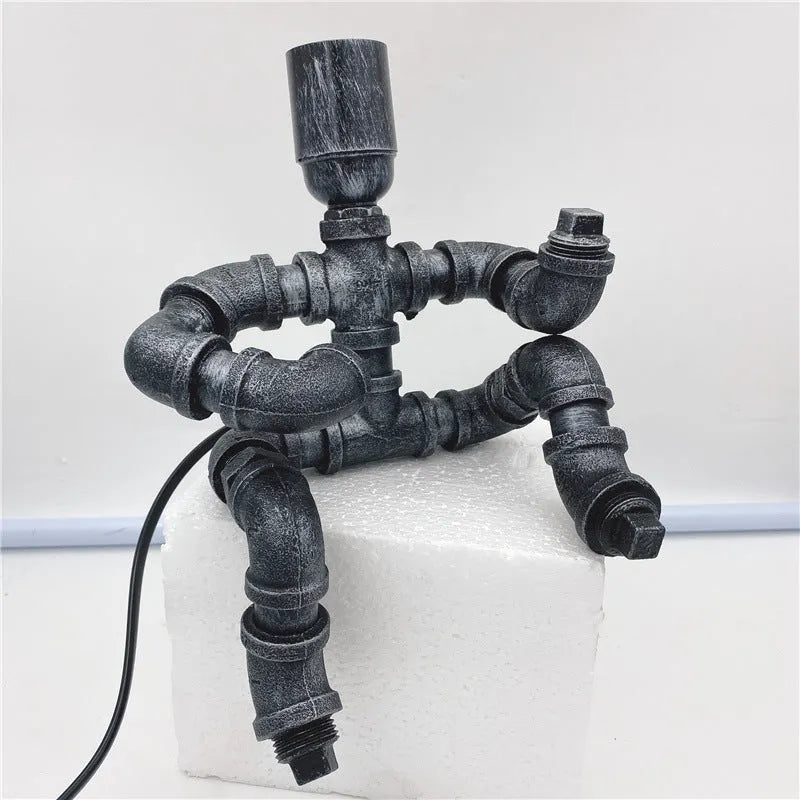 Iron pipe industrial retro table lamp with customisable water pipe design on wooden desk