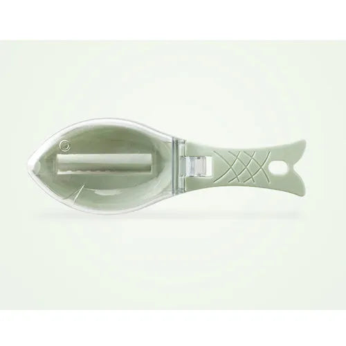 White fish-shaped kitchen scaler tool with a cover and hanging hole on handle