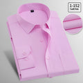 Men's long sleeved linen shirt in pink diagonal check pattern on a hanger.