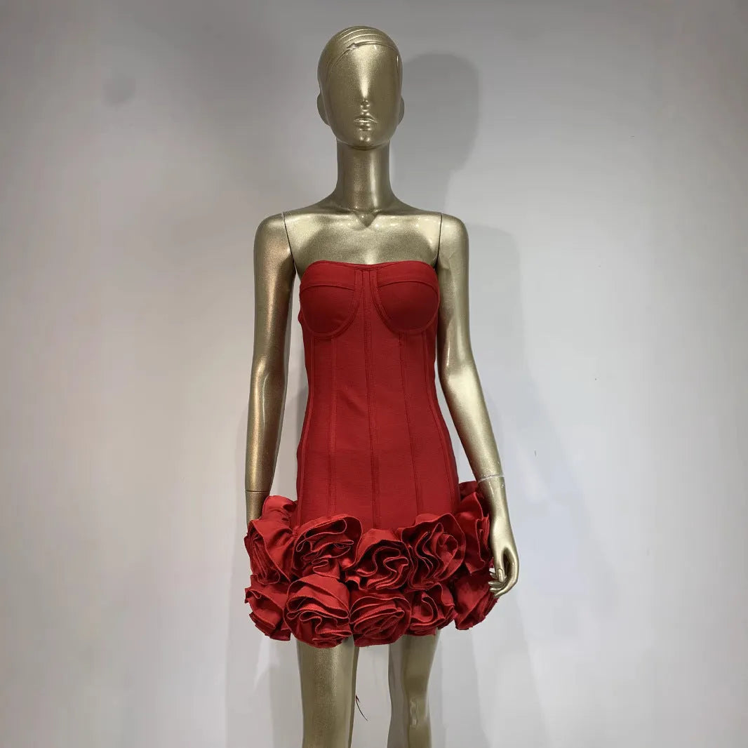 A women's solid colour polyester dress with a mid-waist in red, white, or black.