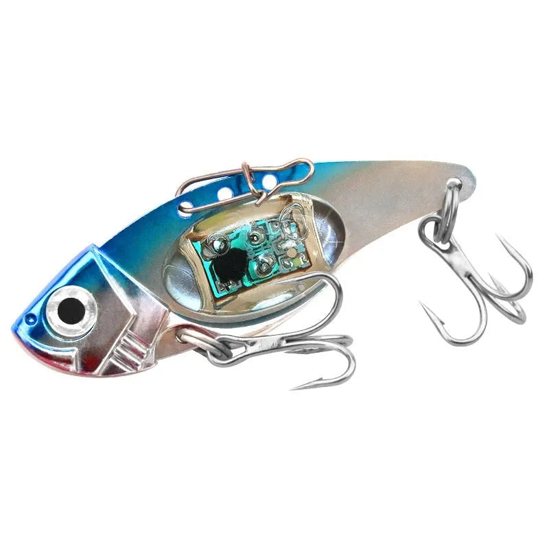 Metal Vib electronic fishing lure with luminous body in blue and red colour options