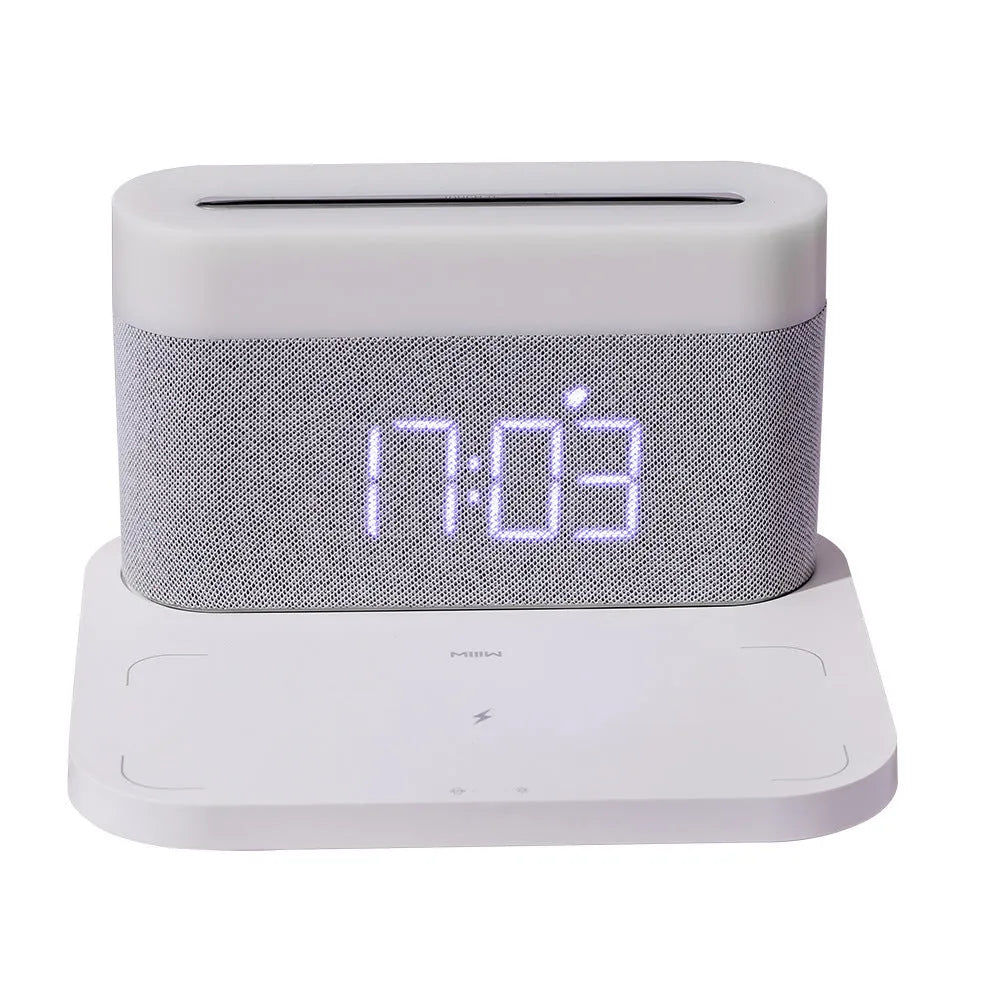 White wireless charging table lamp with digital clock display and bedside lighting functions
