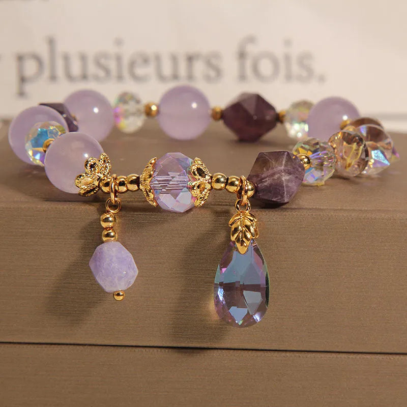 Lavender purple crystal water drop bracelet for children in a retro design.
