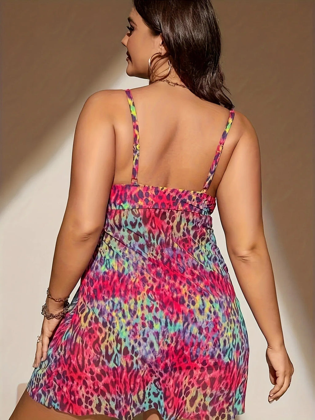 Plus size split bikini set with sleeveless top and shorts for swimming, available in red, rose red, blue, and purple colours.