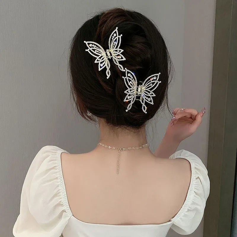 Butterfly hair barrette measuring 6.7cm x 6.2cm with electroplated alloy construction