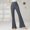 Female classical dance practice trousers in polyester fibre with solid colour pattern, showing S to XL sizing options