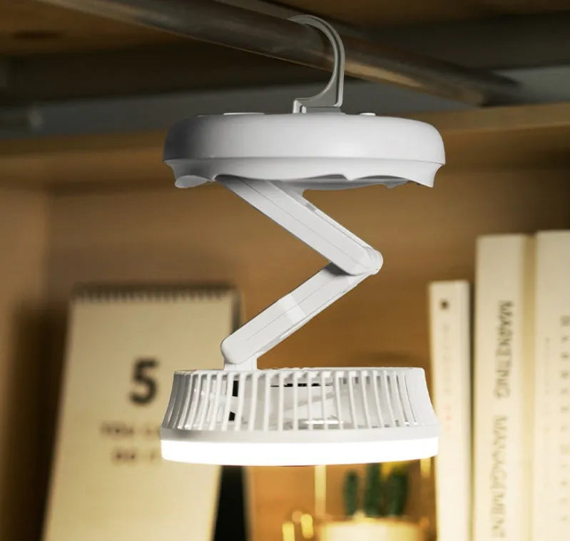 Blue foldable table fan with LED light showing 300° rotation angle and Type-C charging port