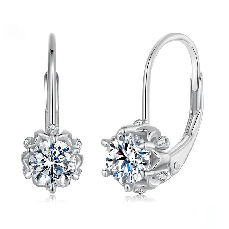 Close-up of a sterling silver floral ear clip with moissanite stone and white gold plating