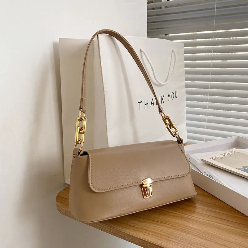 French casual brown PU underarm shoulder bag with chain strap and horizontal square sandwich pocket design.