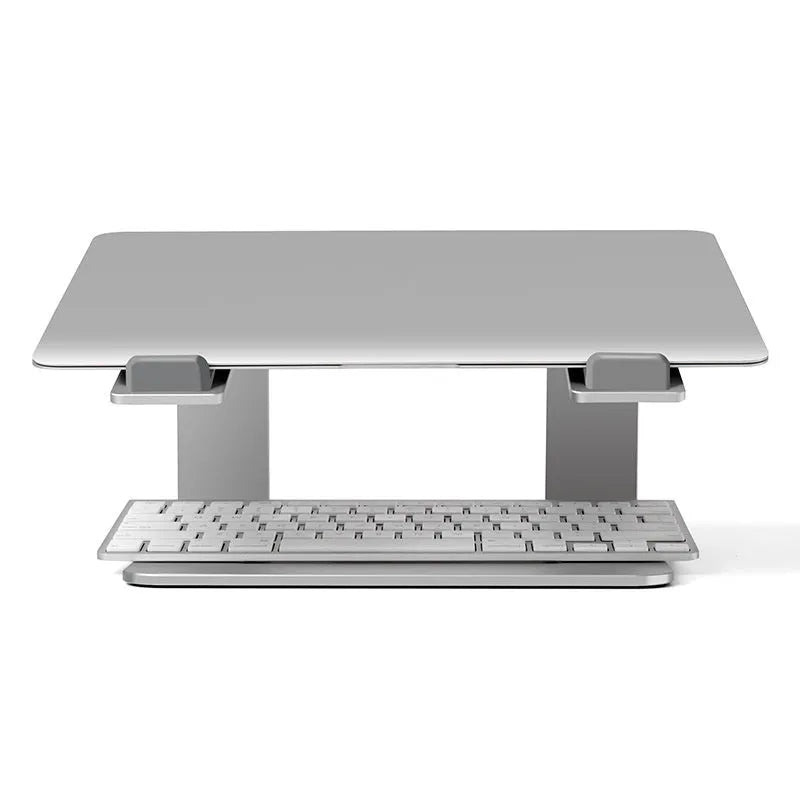 Aluminium alloy laptop stand in black or silver on a desk, showing its raised platform design.