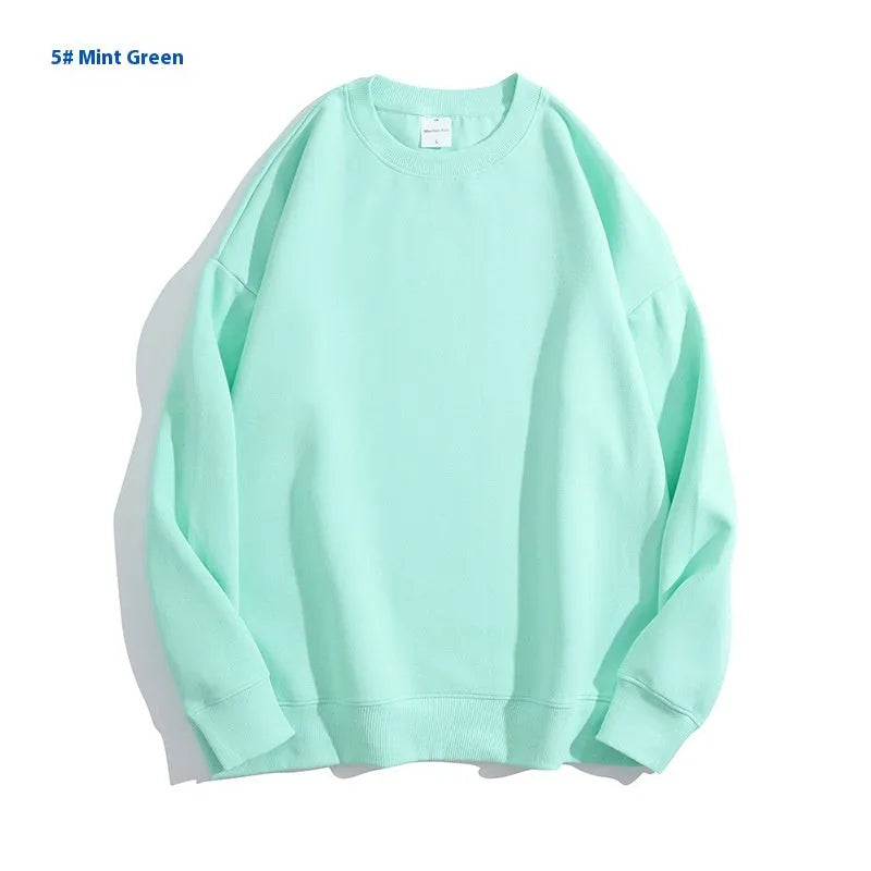 Cotton off-shoulder sweater in loose fit with round neck and long sleeves, available in multiple colours