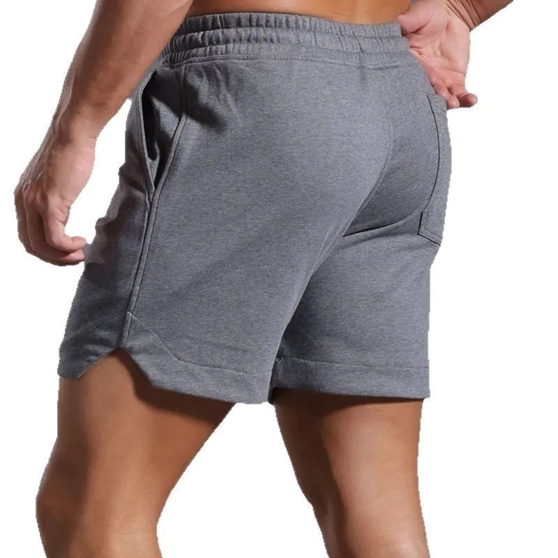 Men's below-the-knee cotton workout running capris in light gray, loose straight mid waist summer shorts