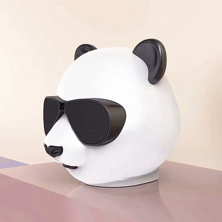 Portable mini Bluetooth speaker with classic style design showing USB port for charging
